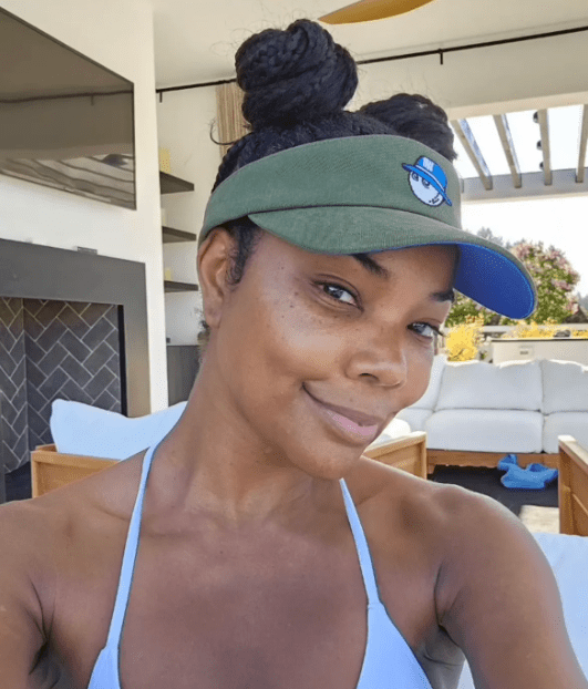 Gabrielle Union pairs Braided Space Buns with Visor Combo